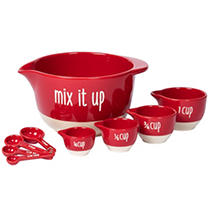 Add some vintage-inspired charm to cooking with the 9-Piece Mixing Bowl and Measuring Set. Handcrafted from ultra-durable ceramic, this set adds a retro vibe to meal prep and baking. The mixing bowl is the perfect size for mixing and serving with "Mix It Up" stamped onto the side. The coordinating red ceramic measuring spoons and measuring cups have their measurements stamped onto the handles for at-a-glance convenience. This includes a larger 10" mixing Bowl, 4 Measuring Cups (1 cup, 3/4 cup, 1/2 cup, & 1/4 cup), and 4 Measuring Spoons (1tbsp, 1tsp, 1/2tsp, & 1/4tsp)