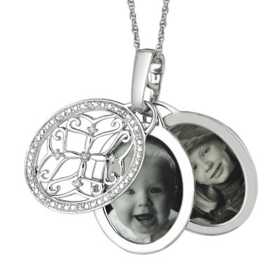 0.10 ct. t.w. Diamond Oval Locket Pendant in Sterling Silver (I, I1)