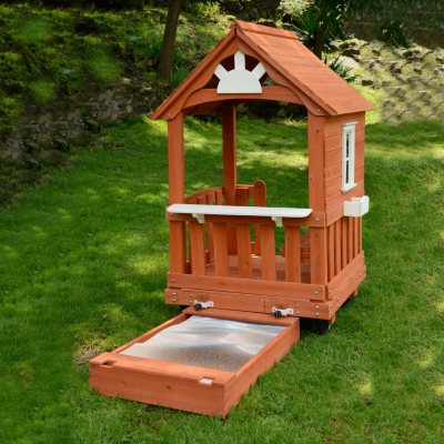 outdoor playhouse with sandbox