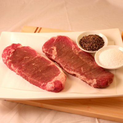 Steakhouse Certified Savory New York Strip Steaks - 8 oz. - 8 ct. case