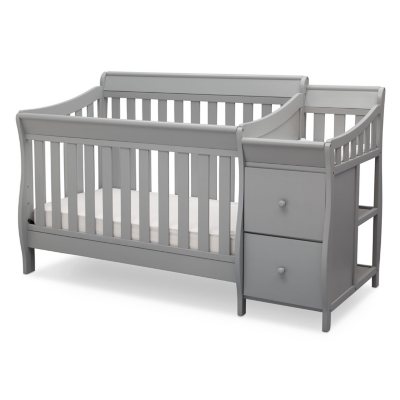 crib with changing table on left side