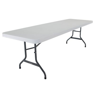 white folding table and chairs