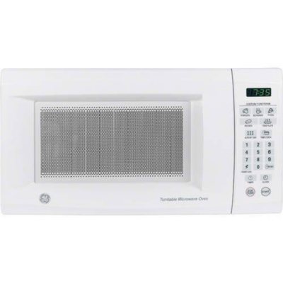 GE 0.7 cu. ft. Small Countertop Microwave in White for Sale in