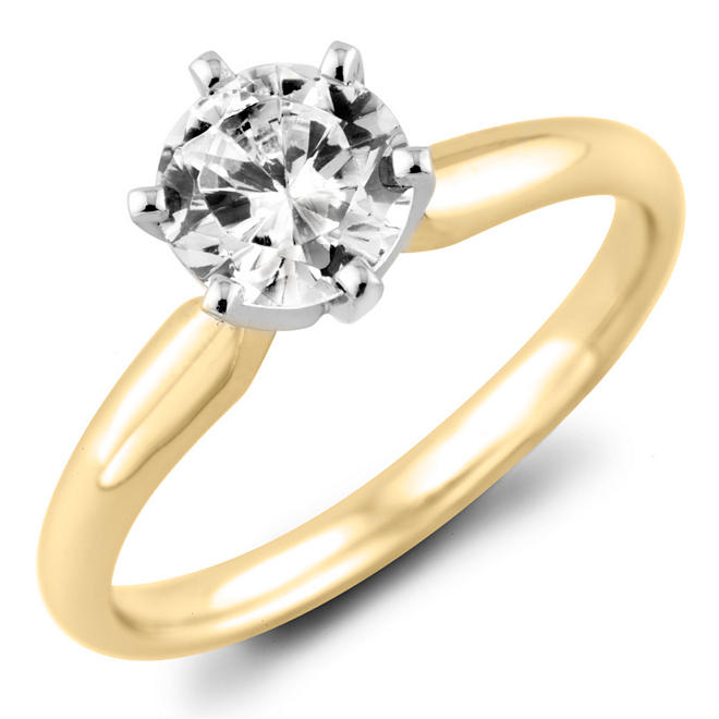 0.47 CT. T.W.. Round Diamond Solitaire Ring in 18K Gold with Platinum Head (H, VS2)