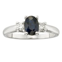 Three Stone Oval Sapphire Ring with .20CT. T.W. Diamond Set in 14K Gold