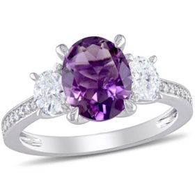 Oval Cut Amethyst & 0.58 CT. T.W. Diamond 3-Stone Ring in 14K Gold