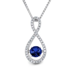 Dancing Lab Created Blue Sapphire and 0.12 CT. T.W. Diamond Infinity Pendant in Sterling Silver