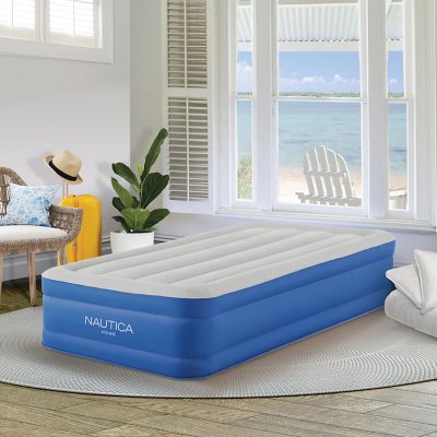 Inflatable twin air outlet mattress