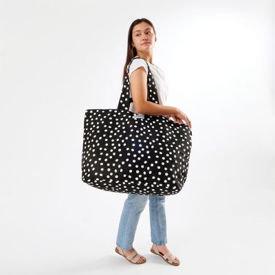 Black and white Mini Museum tote bag with polka dots