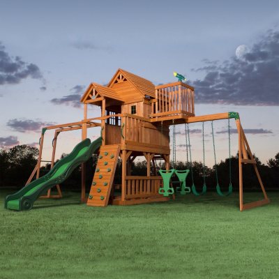 outdoor playhouse with slide and swing