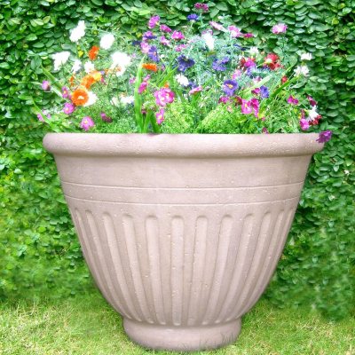 Image of a Big Pot With Design In a Lawn Of a Park-PE825562-Picxy