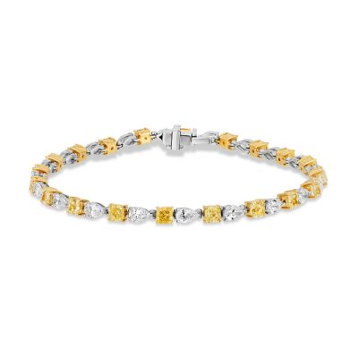 7.49 CT. TW Cushion and Pear Cut White and Natural Yellow Diamond Bracelet in 18K Gold