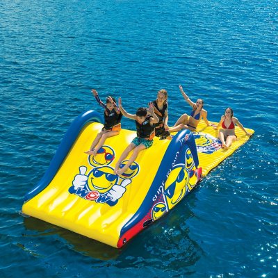 Inflatable floating store water slide