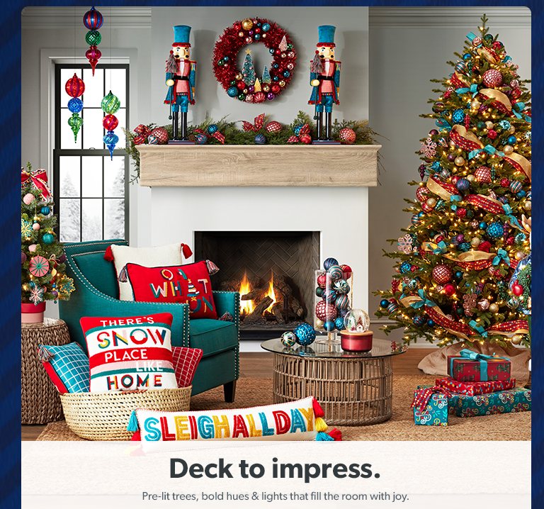 Deck to impress. Pre lit trees, bold hues and lights that fill the room with joy.