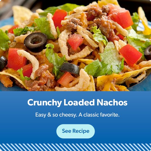 Crunchy Loaded Nachos are easy and so cheesy. See recipe.