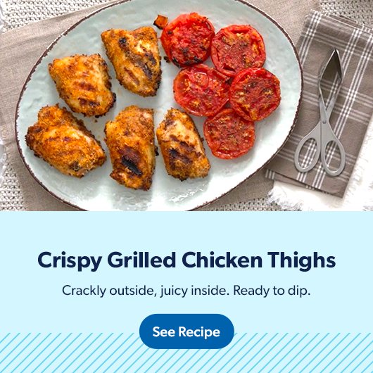 Crispy grilled chicken thighs have a crackly outside and are ready to dip. See recipe.